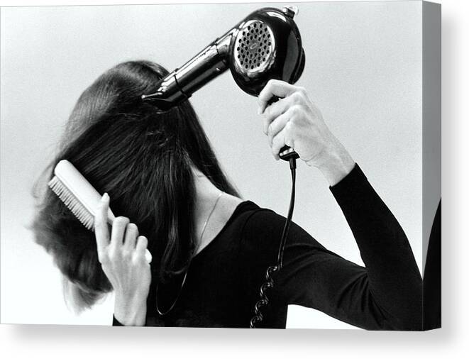 Hair Canvas Print featuring the photograph Model Blow Drying Hair #2 by Mike Reinhardt