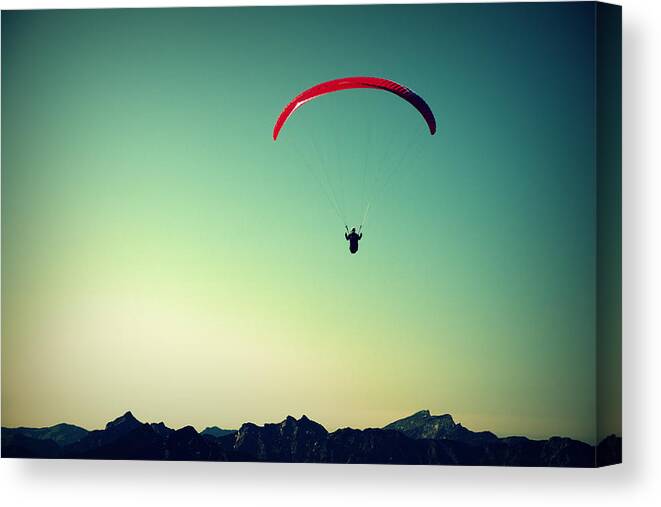 Paraglider Canvas Print featuring the photograph Paraglider #2 by Chevy Fleet