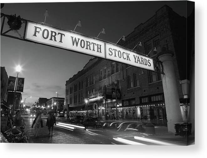 Photography Canvas Print featuring the photograph Signboard Over A Road At Dusk, Fort #2 by Panoramic Images