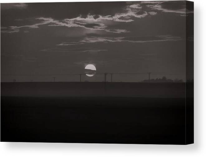 Cloud Canvas Print featuring the photograph The setting sun in the distance with clouds #2 by Ashish Agarwal