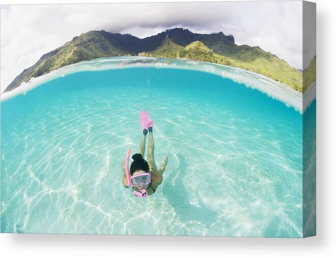 Amaze Canvas Print featuring the photograph Woman free diving #2 by M Swiet Productions