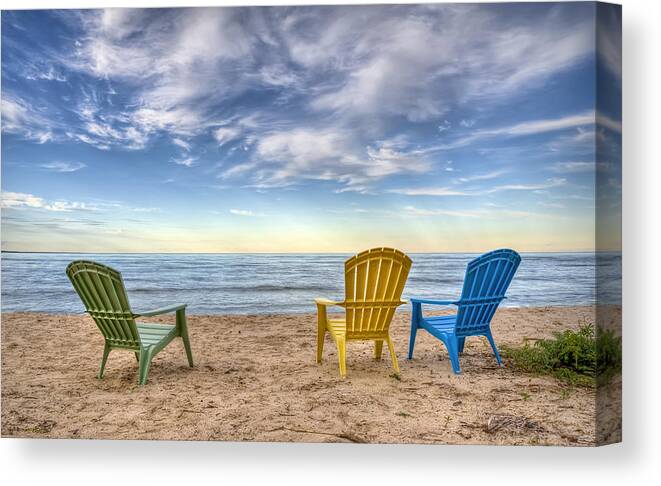 Chairs Beach Water Lake Sky Ocean Summer Relax Lake Michigan Wisconsin Door County Sand Chair Clouds Horizon Peace Calm Quiet Rest Vacation Waves Home Decor Fine Art Photography Fine Art For Sale Blue Yellow Green Landscape Photography Nautical Beach Scene Outdoors Shore Coast Canvas Print featuring the photograph 3 Chairs by Scott Norris
