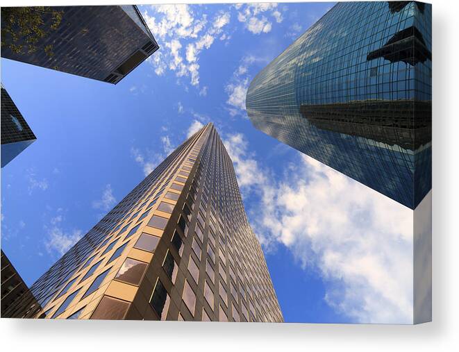 Architecture Canvas Print featuring the photograph Skyscrapers by Raul Rodriguez