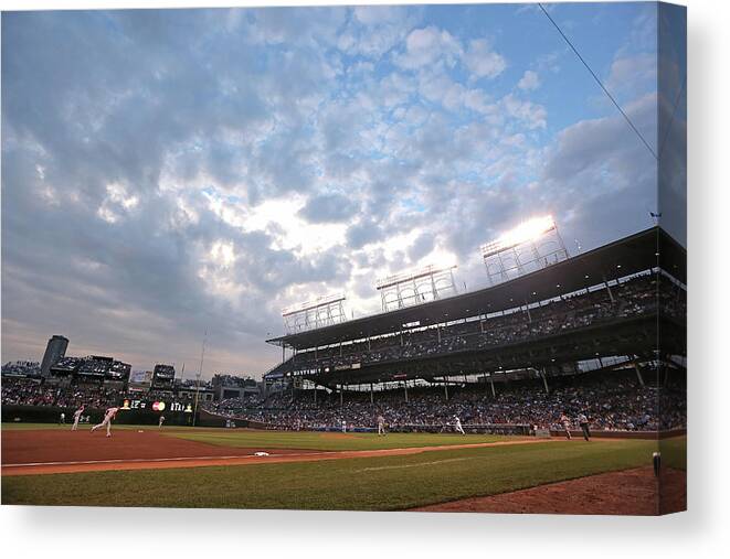 National League Baseball Canvas Print featuring the photograph Cincinnati Reds V Chicago Cubs #4 by Jonathan Daniel