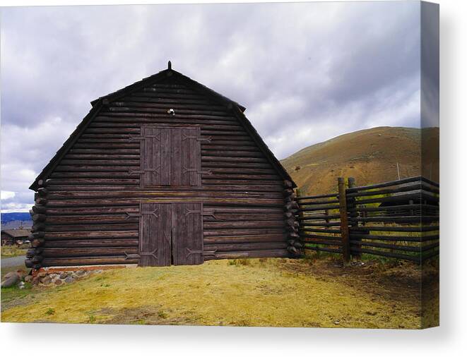 Barns Canvas Print featuring the photograph A Barn In Wyoming by Jeff Swan