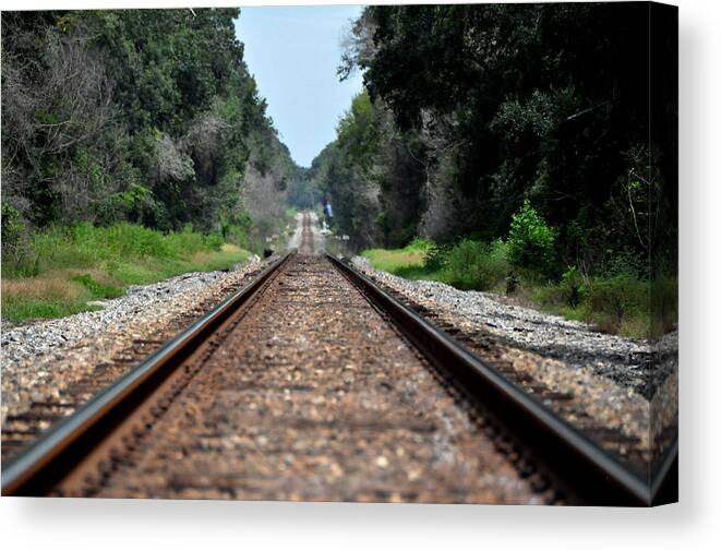 Train Track Prints Canvas Print featuring the photograph A Long Way Home by John Black
