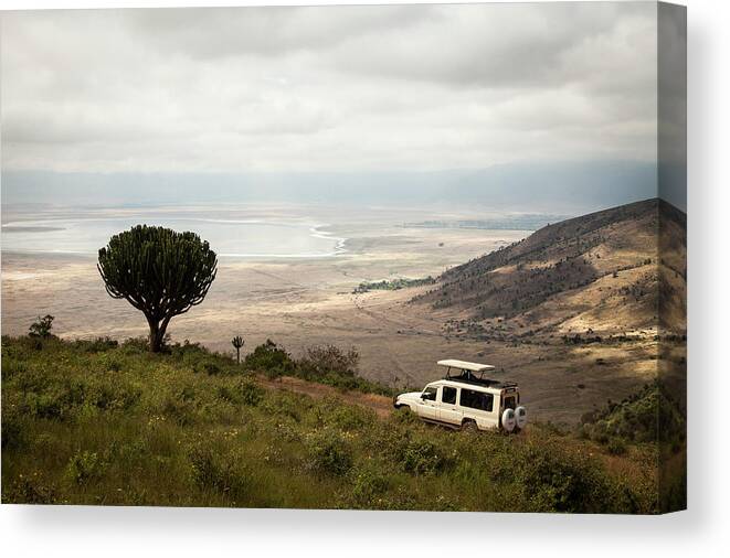 Tranquility Canvas Print featuring the photograph A Safari Truck Descends Into The by Tegra Stone Nuess