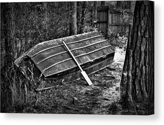 Abandoned Canvas Print featuring the photograph Abandoned Rowboat by Tara Potts