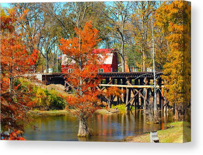 Barn Canvas Print featuring the photograph Across The Bridge by Karen Wagner