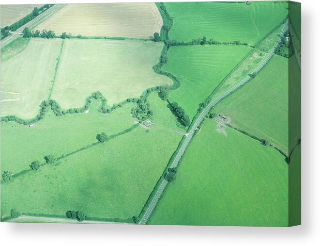 Scenics Canvas Print featuring the photograph Aerial View Of Rural Fields And Road by Peter Muller