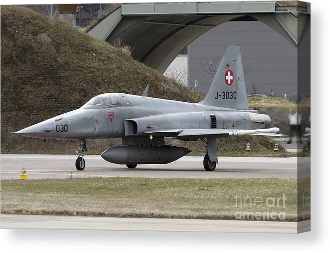 Aircraft Canvas Print featuring the photograph An F-5 Tiger Aircraft Of The Swiss Air by Luca Nicolotti
