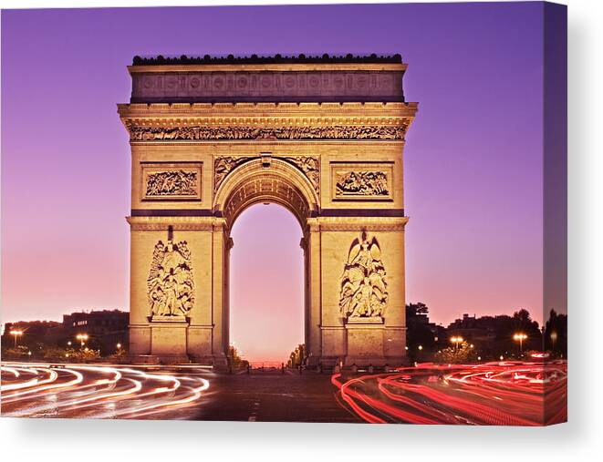 Arc De Triomphe Canvas Print featuring the photograph Arc de Triomphe Facade / Paris by Barry O Carroll