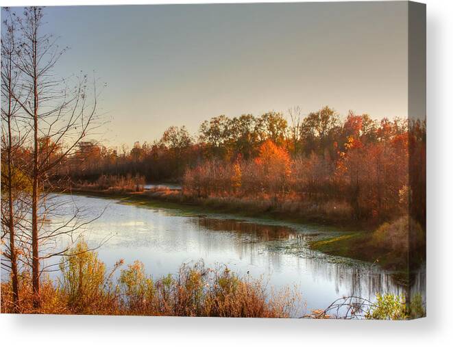 Sunset Photographs Canvas Print featuring the photograph Autumn Sunset Reflection by Ester McGuire