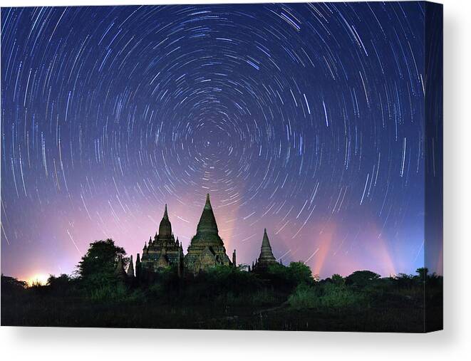 Pagoda Canvas Print featuring the photograph Bagan Star Trails, Myanmar 2013 by Monthon Wa