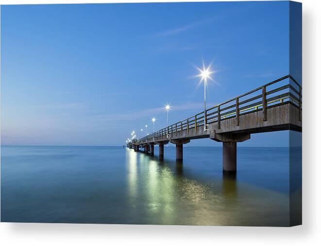 Tranquility Canvas Print featuring the photograph Baltic Sea And Pier At Dusk by Jorg Greuel