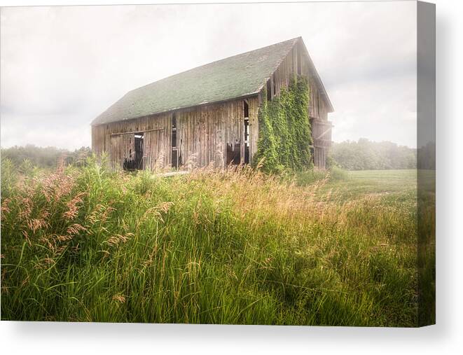 Misty Barn Canvas Print featuring the photograph Barn in a misty field by Gary Heller
