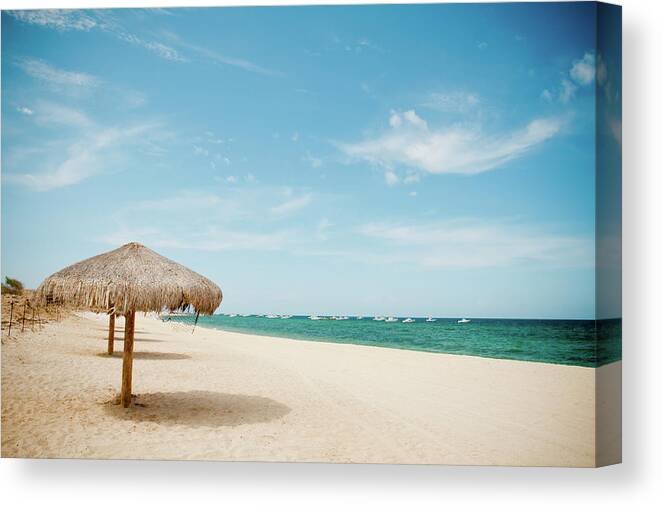 Tranquility Canvas Print featuring the photograph Beach Umbrella by Christopher Kimmel