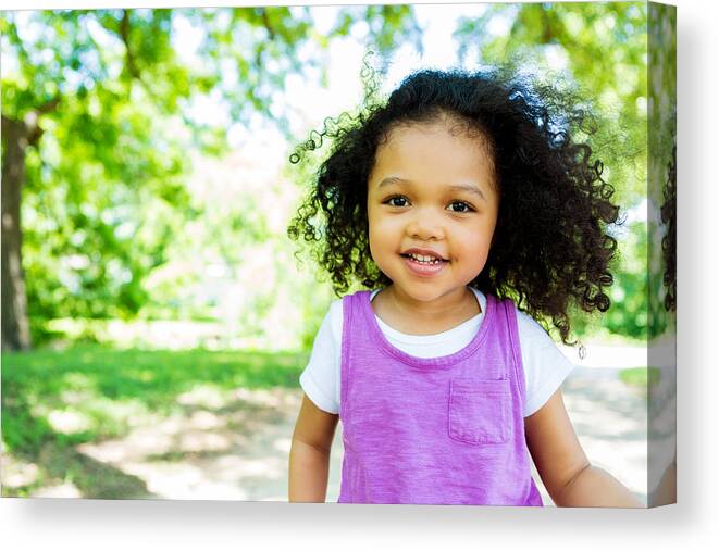 Toddler Canvas Print featuring the photograph Beautiful little girl in the park by Steve Debenport