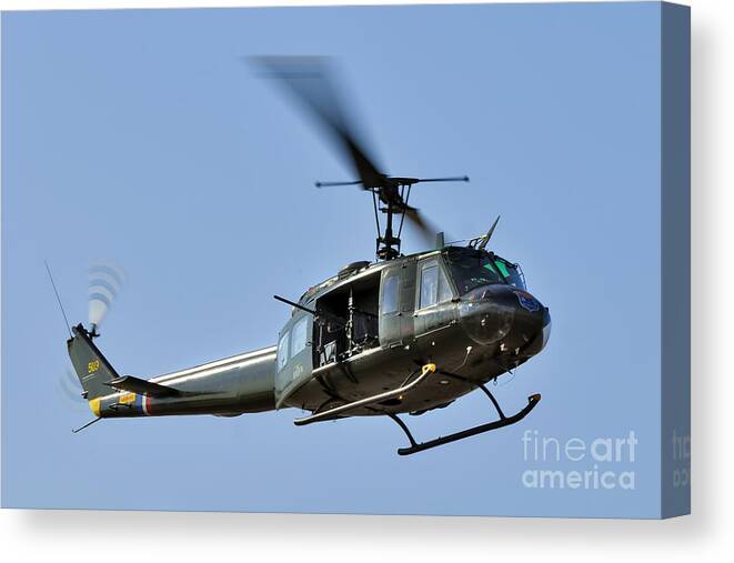Huey Canvas Print featuring the photograph Bell UH-1 Iroquois Helicopter - Huey by Steve H Clark Photography