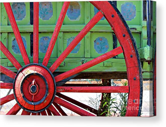 Wheel Canvas Print featuring the photograph Big Red by Clare Bevan