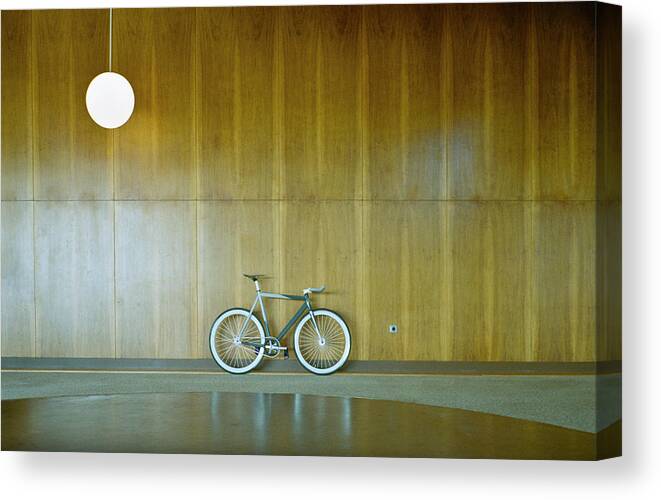 Empty Canvas Print featuring the photograph Bike Parked Against Wood Paneling by Dejan
