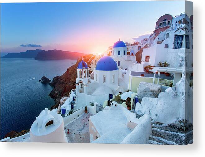 Greek Culture Canvas Print featuring the photograph Blue Domed Churches At Sunset, Oia by Sylvain Sonnet