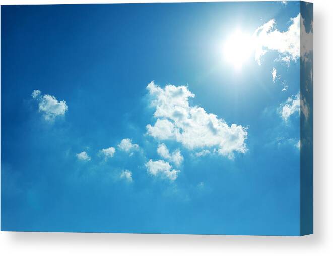 Financial District Canvas Print featuring the photograph Blue Sky and Sun by Runstudio