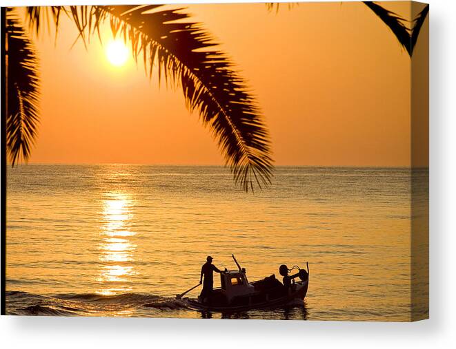 Vacations Canvas Print featuring the photograph Boat at sea Sunset golden color with palm by Raimond Klavins