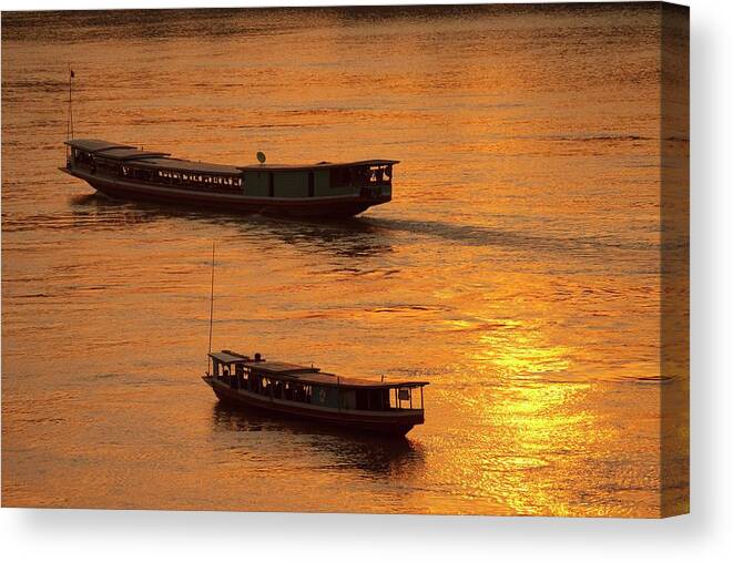 Boat Canvas Print featuring the photograph Boats On The Mekong River by Peter Menzel/science Photo Library