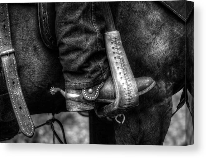 Saddle Canvas Print featuring the photograph Boot and Saddle in Black and White by Greg and Chrystal Mimbs