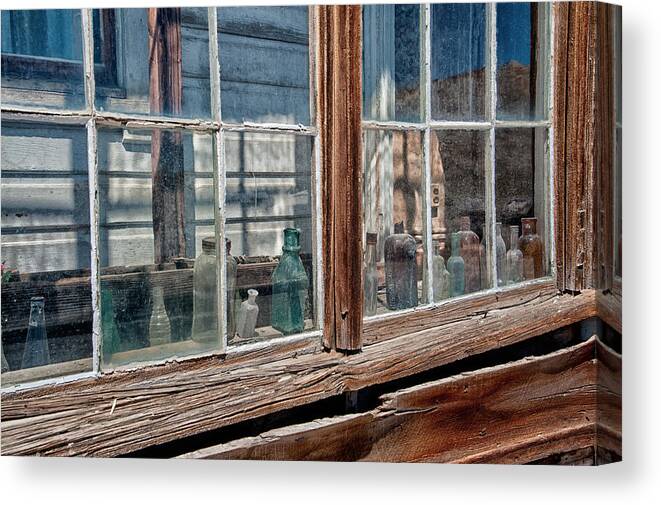 Glass Canvas Print featuring the photograph Bottles in the Window by Cat Connor