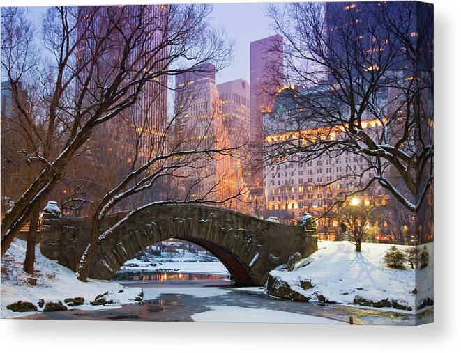Snow Canvas Print featuring the photograph Bridge Over Pond At Dusk In Central by Richard I'anson