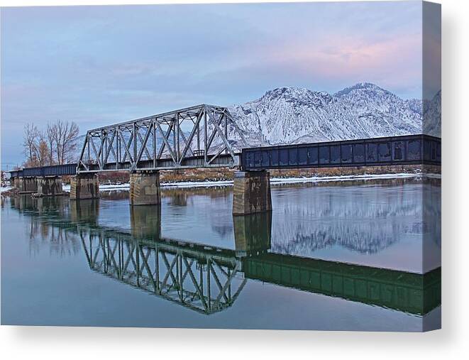 Landscape Canvas Print featuring the photograph Bridge Over Tranquil Waters in Kamloops British Columbia by Steve Boyko