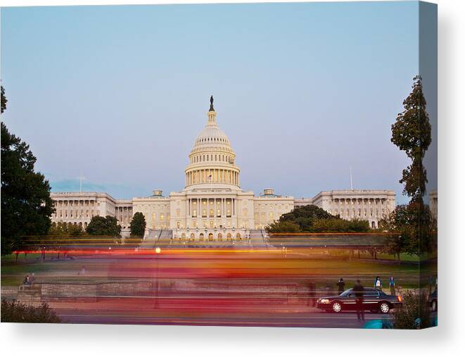 Capitol Canvas Print featuring the photograph Bus Blur and U.S.Capitol Building by Richard Nowitz