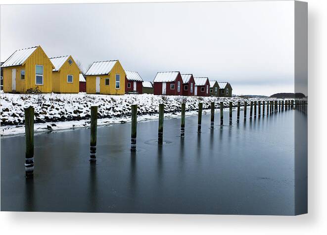 Building Canvas Print featuring the photograph Cabins by the harbour by Mike Santis