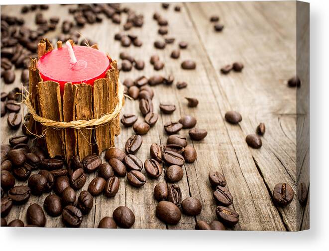 Coffee Beans Canvas Print featuring the photograph Candle wrapped in cinnamon by Aged Pixel