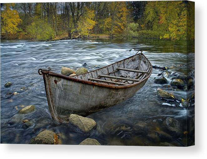 Water Canvas Print featuring the photograph Canoe aground on the Thornapple River in Autumn by Randall Nyhof