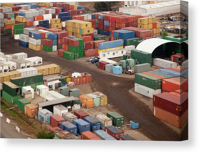 Freight Transportation Canvas Print featuring the photograph Cargo Containers In A Freight Yard by Tobias Titz