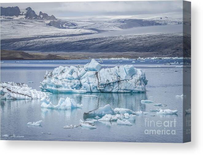 Jokulsarlon Canvas Print featuring the photograph Chasing Ice by Evelina Kremsdorf