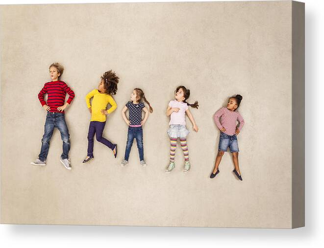 Toddler Canvas Print featuring the photograph Children standing with hands on hips by Westend61