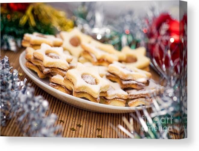 Bake Canvas Print featuring the photograph Christmas cookies by Viktor Pravdica