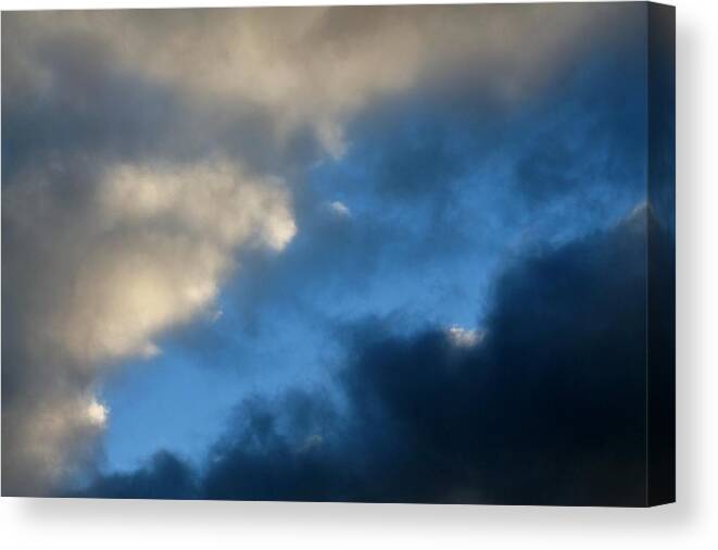 Clouds Canvas Print featuring the photograph Clouds Converging by Michael Saunders