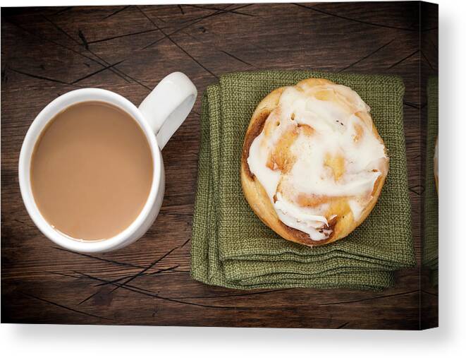 Breakfast Canvas Print featuring the photograph Coffee And Cinnamon Roll by J Shepherd