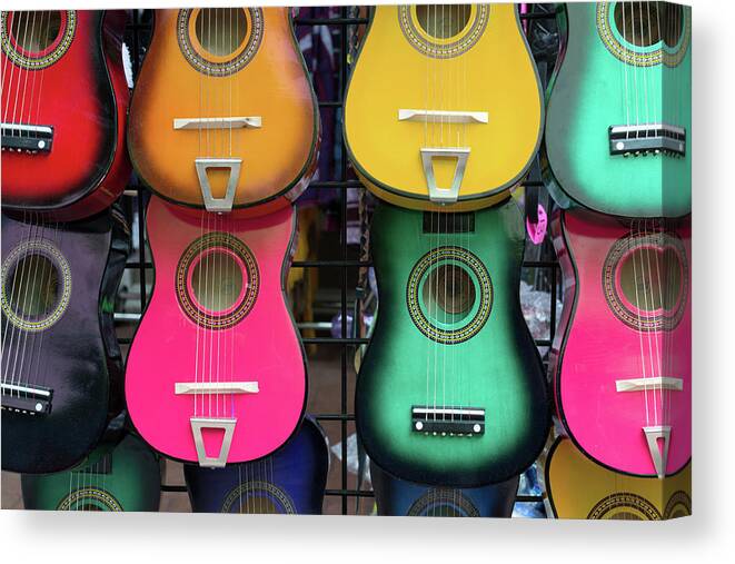 Hanging Canvas Print featuring the photograph Colorful Mexican Guitars by Carol Wood