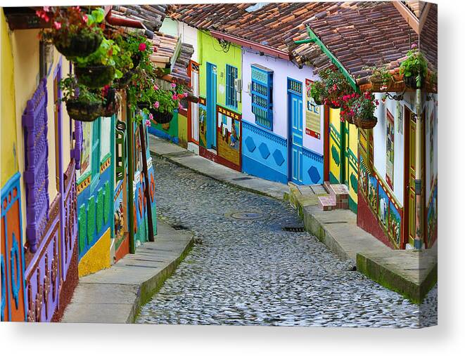Built Structure Canvas Print featuring the photograph colourful architecture in Guatape by Barna Tanko