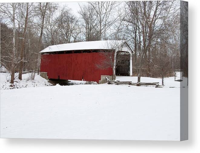 Photography Canvas Print featuring the photograph Covered Bridge In Snow Covered Forest by Panoramic Images
