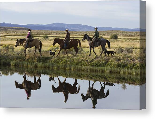 Feb0514 Canvas Print featuring the photograph Cowboys And A Cowgirl Riding Oregon by Konrad Wothe