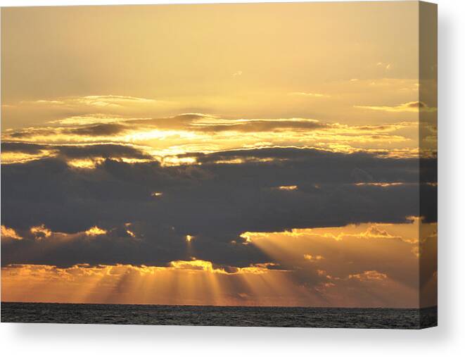 Sunbeam Canvas Print featuring the photograph Dark Cloud Over Sea With Sunbeams by Bradford Martin