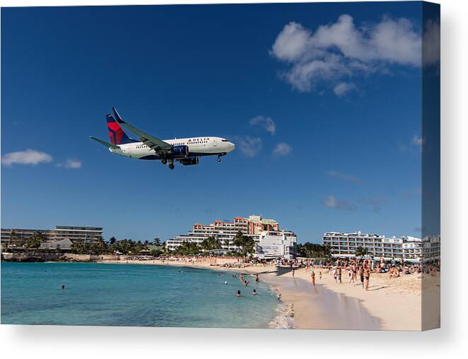 Delta Air Lines Canvas Print featuring the photograph Delta 737 St. Maarten landing by David Gleeson