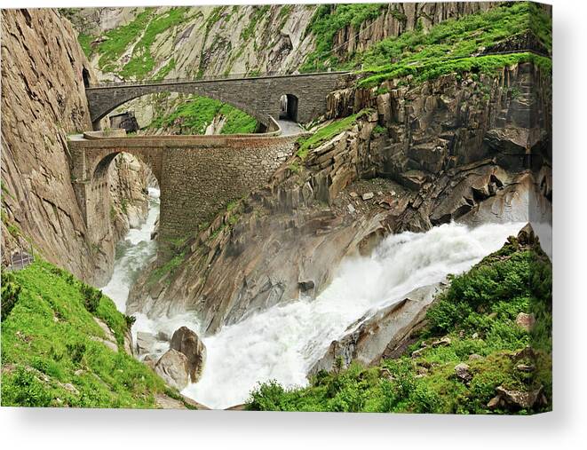 Arch Canvas Print featuring the photograph Devils Bridge, Switzerland by Rusm